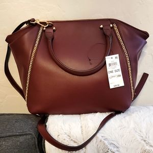 Large Garnet INC tote handbag.